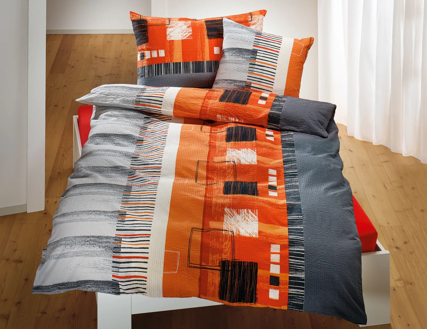 Bettwäsche in orange mit Streifen und Strichmuster