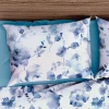 Bettwäsche mit blauen Aquarell-Blüten